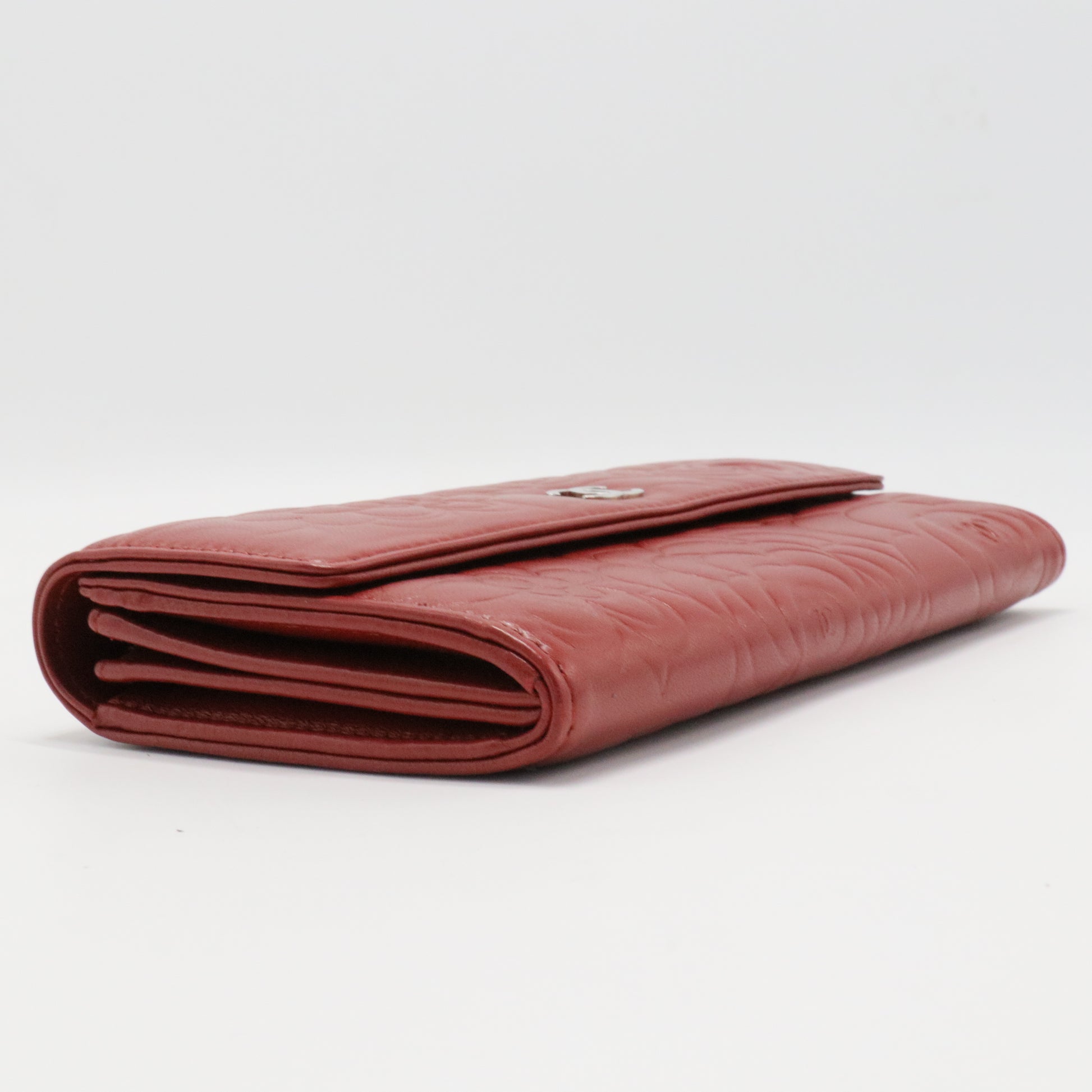 Caviar Camellia Embossed Flap Wallet Red