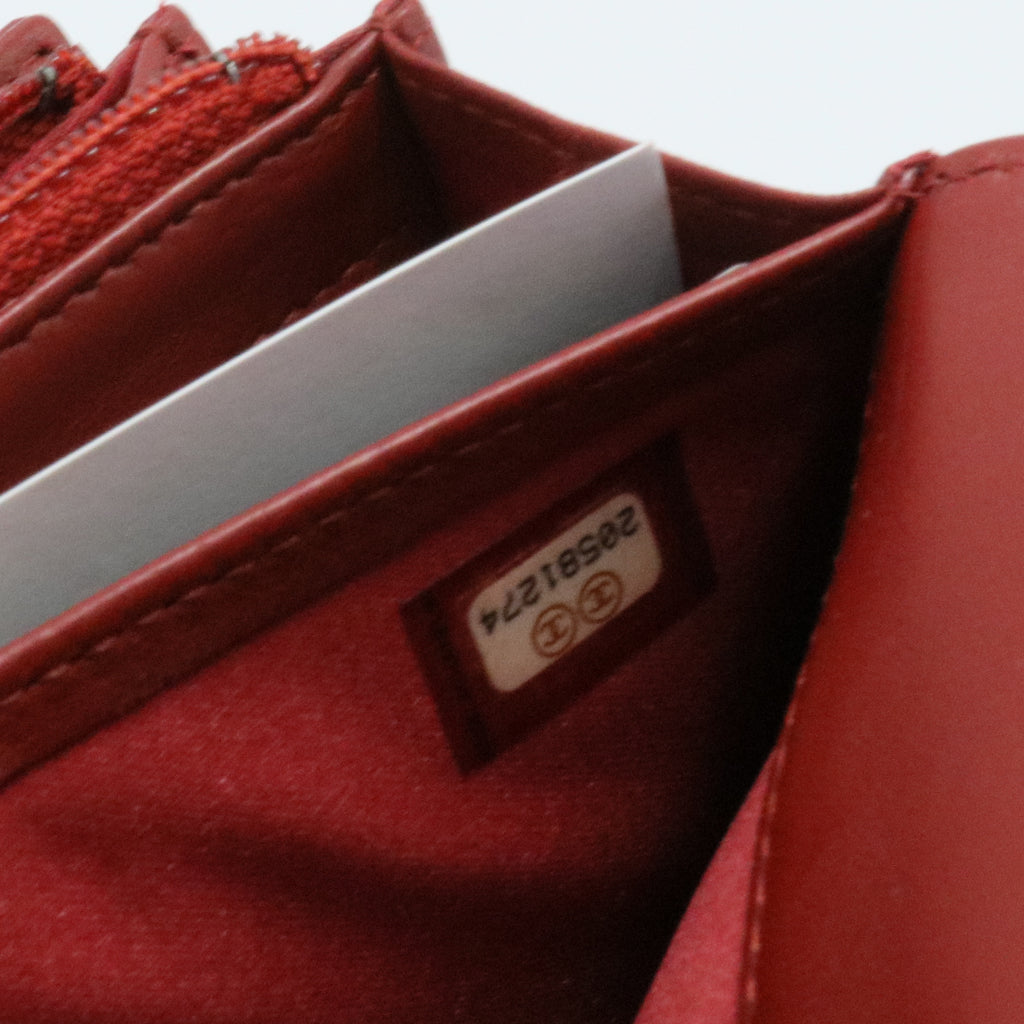 Caviar Camellia Embossed Flap Wallet Red