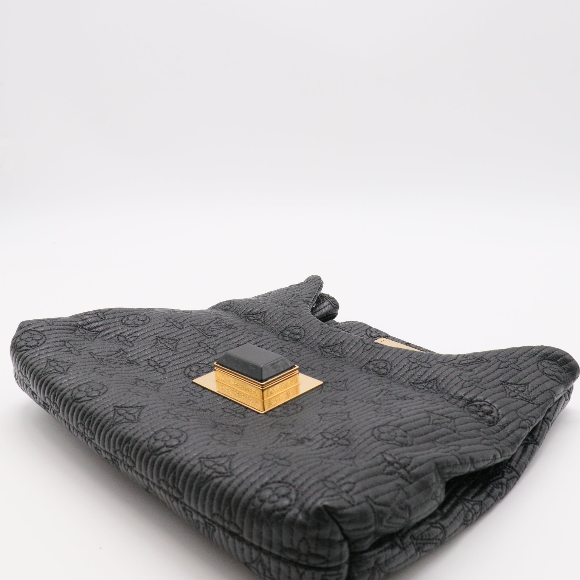 Altair Clutch Quilted Monogram Leather twins