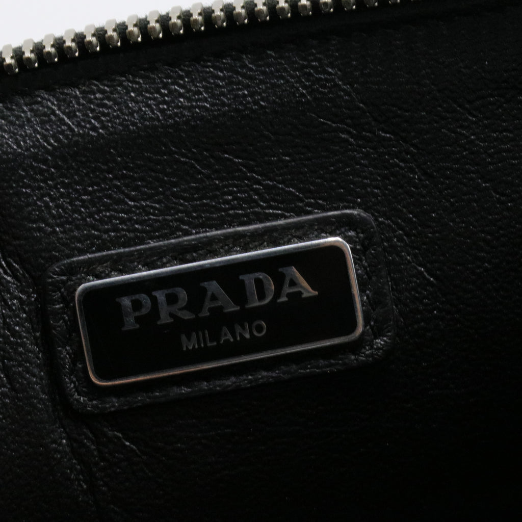 Logo Tape Zipped clutch bag