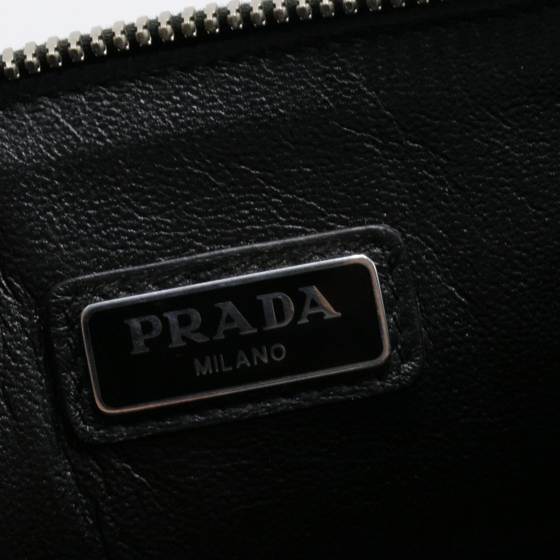 Logo Tape Zipped clutch bag