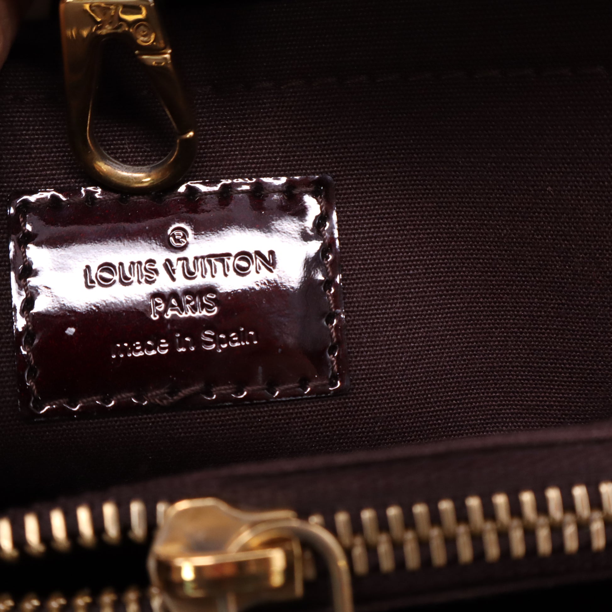 Louis Vuitton Montaigne MM Bag in Amarante Monogram Vernis B22558