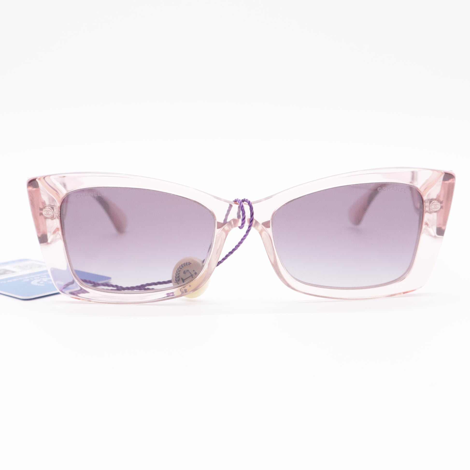 Pink rectangular Chanel sunglasses twins