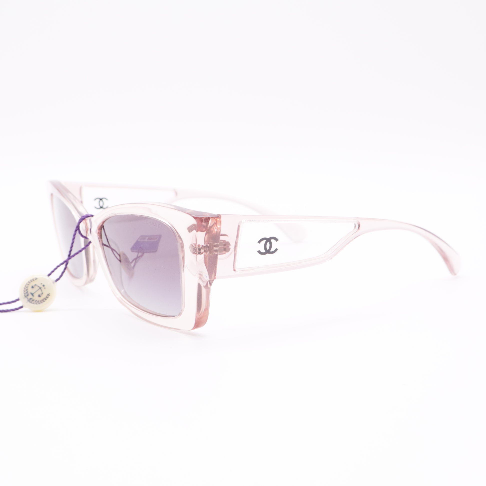 Pink rectangular Chanel sunglasses twins