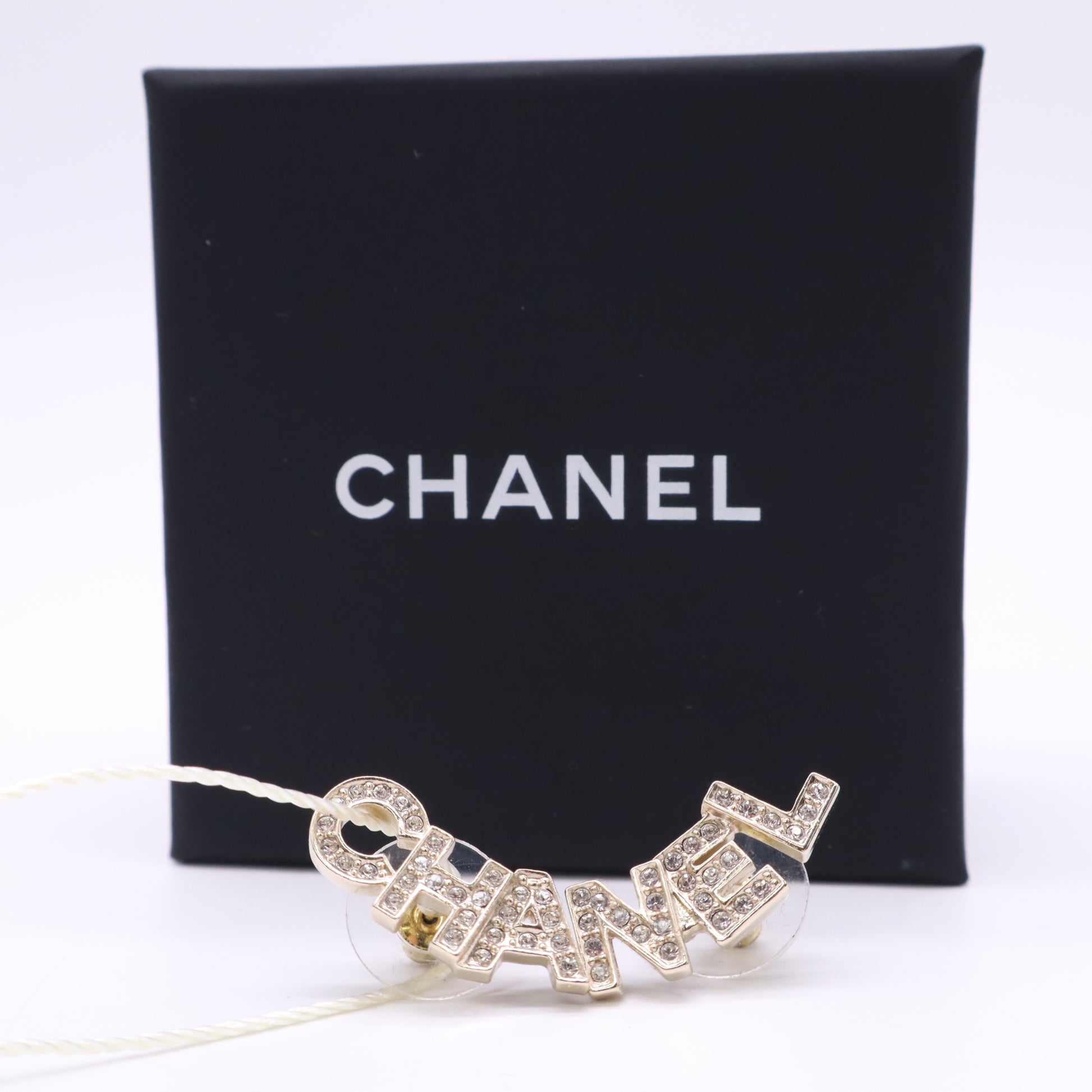 Chanel Signature Stud Earrings Gold Twins LDZ603