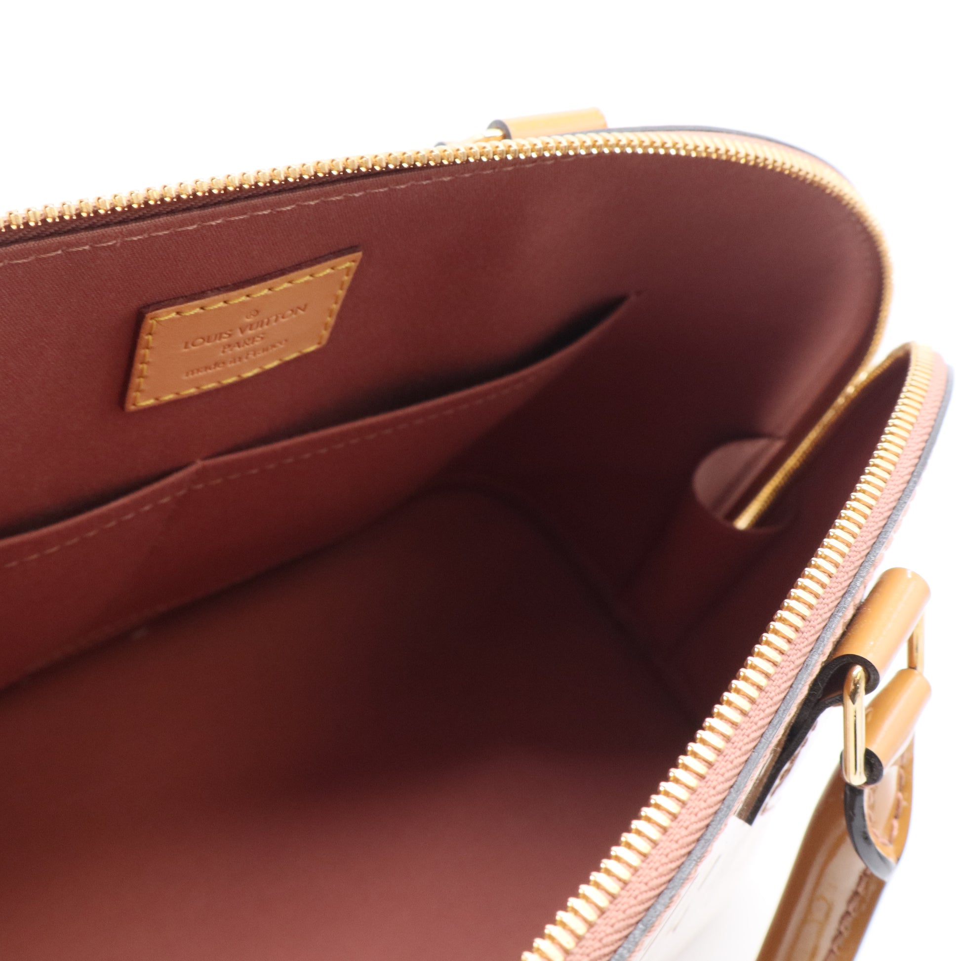 Monogram Vernis Alma PM