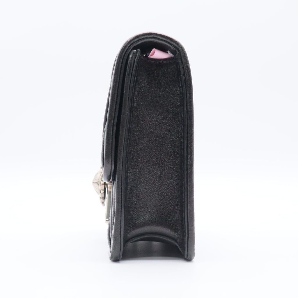 Confidential leather handbag twins