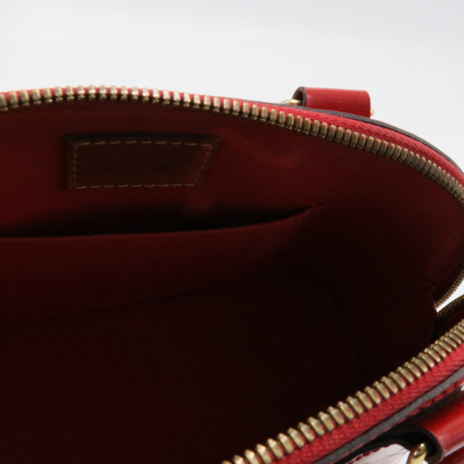 Alma Handbag Monogram Vernis BB
