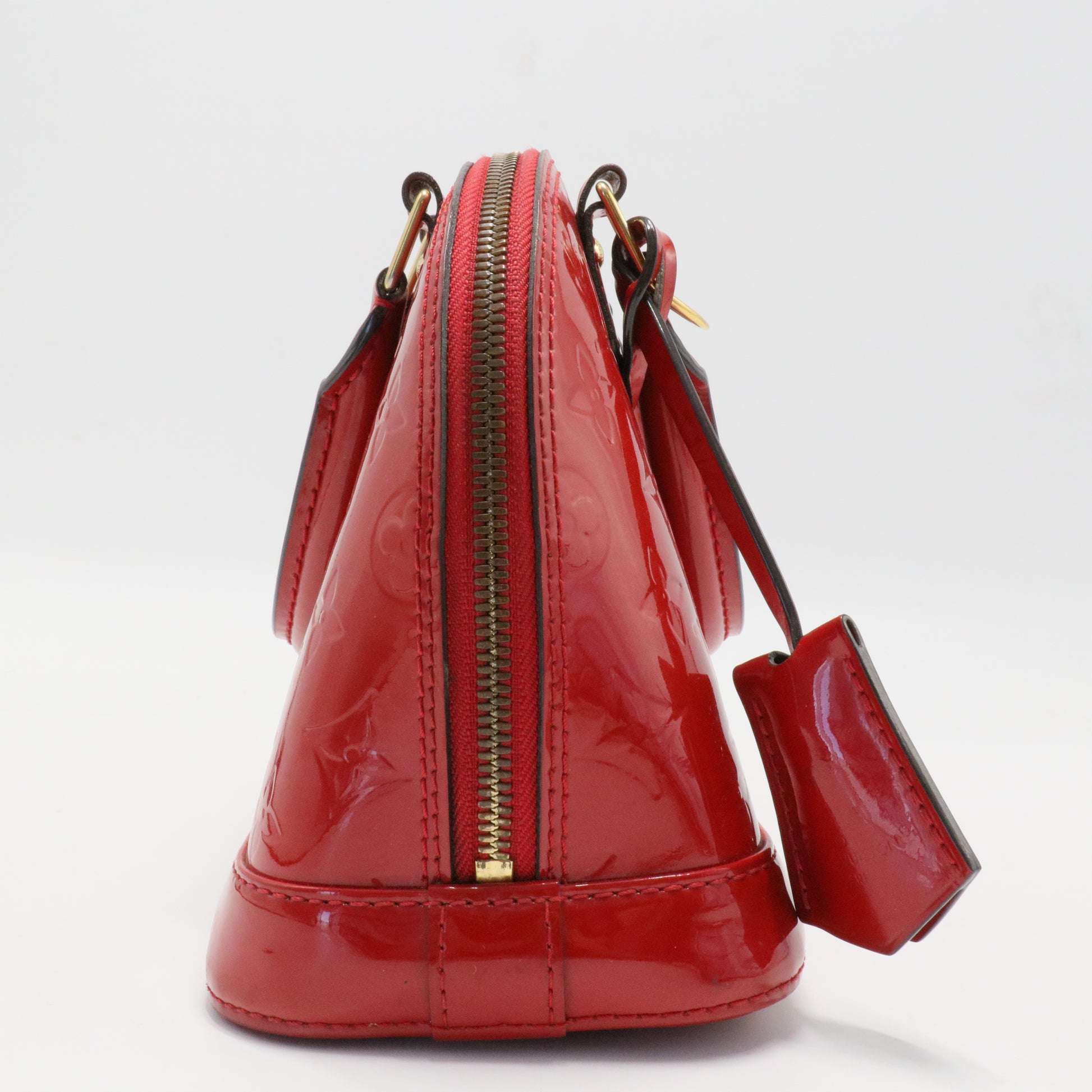 Alma Handbag Monogram Vernis BB