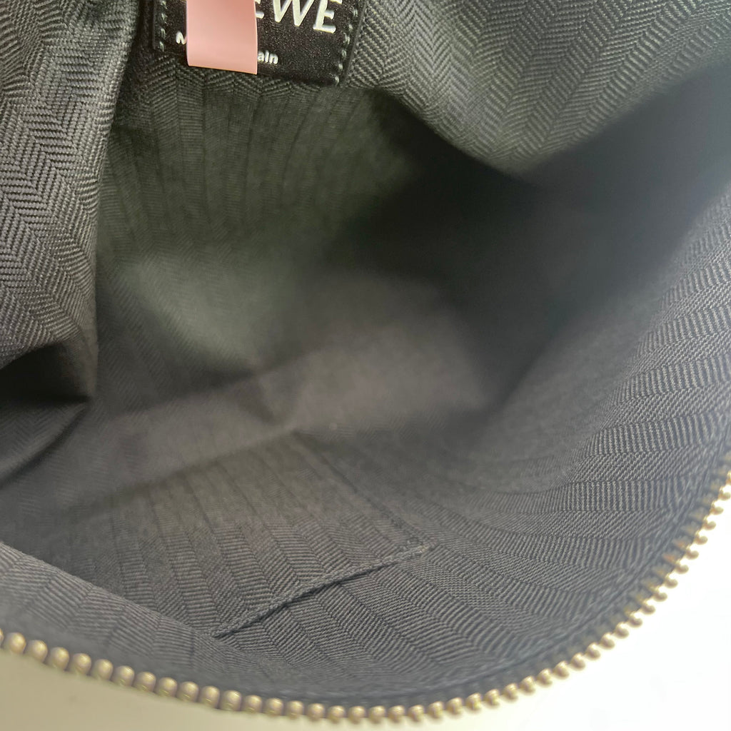 Calfskin Embossed Repeat T Pouch Black twins