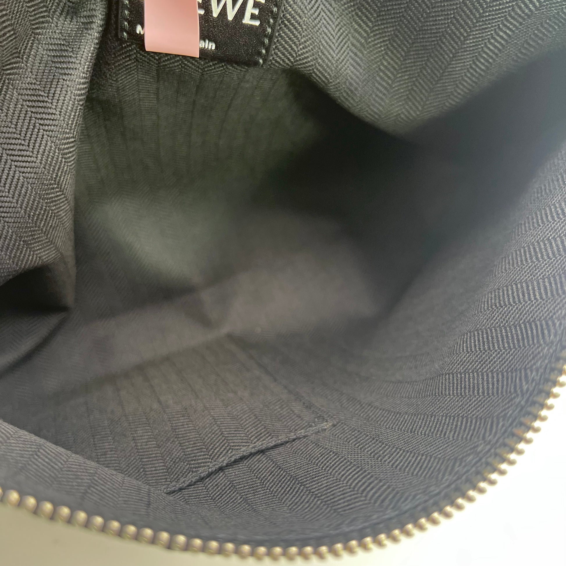 Calfskin Embossed Repeat T Pouch Black twins