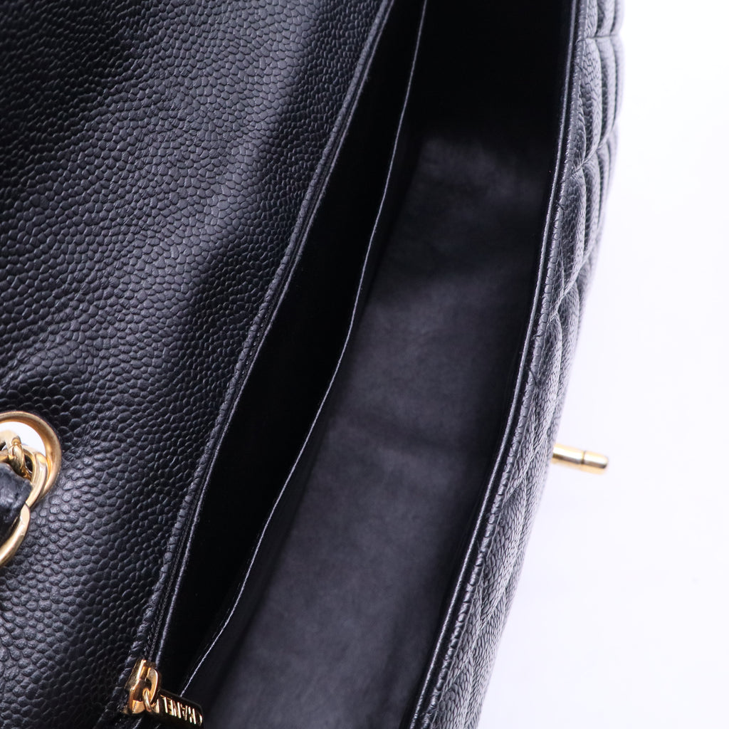 Caviar Quilted Jumbo Single Flap Black B20013