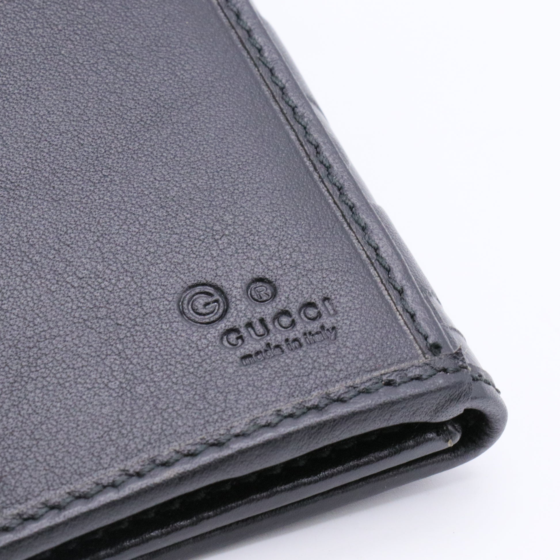 Black Guccissima Leather Continental Flap Wallet twins