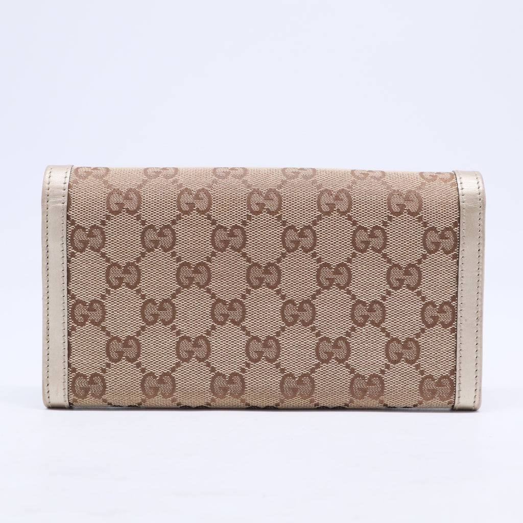 Monogram Sukey Continental Wallet Champagne W20480