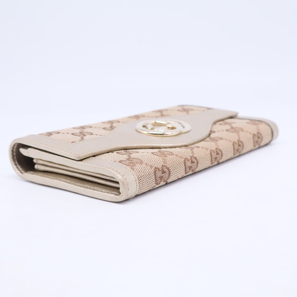 Monogram Sukey Continental Wallet Champagne W20480