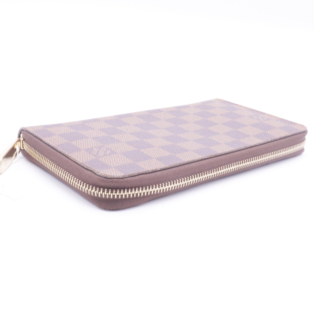 Zippy wallet in Damier Ebene canvas twins