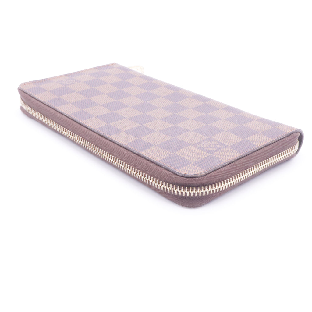 Zippy wallet in Damier Ebene canvas twins