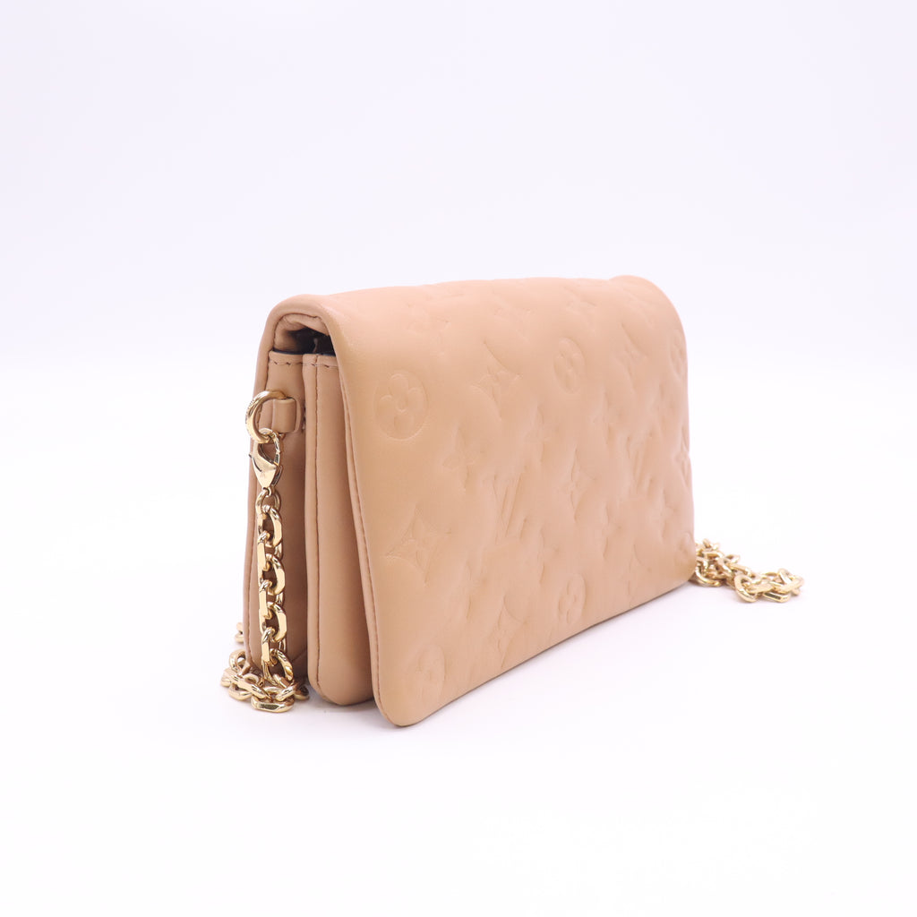 Lambskin Embossed Monogram Pochette Coussin Camel B24552