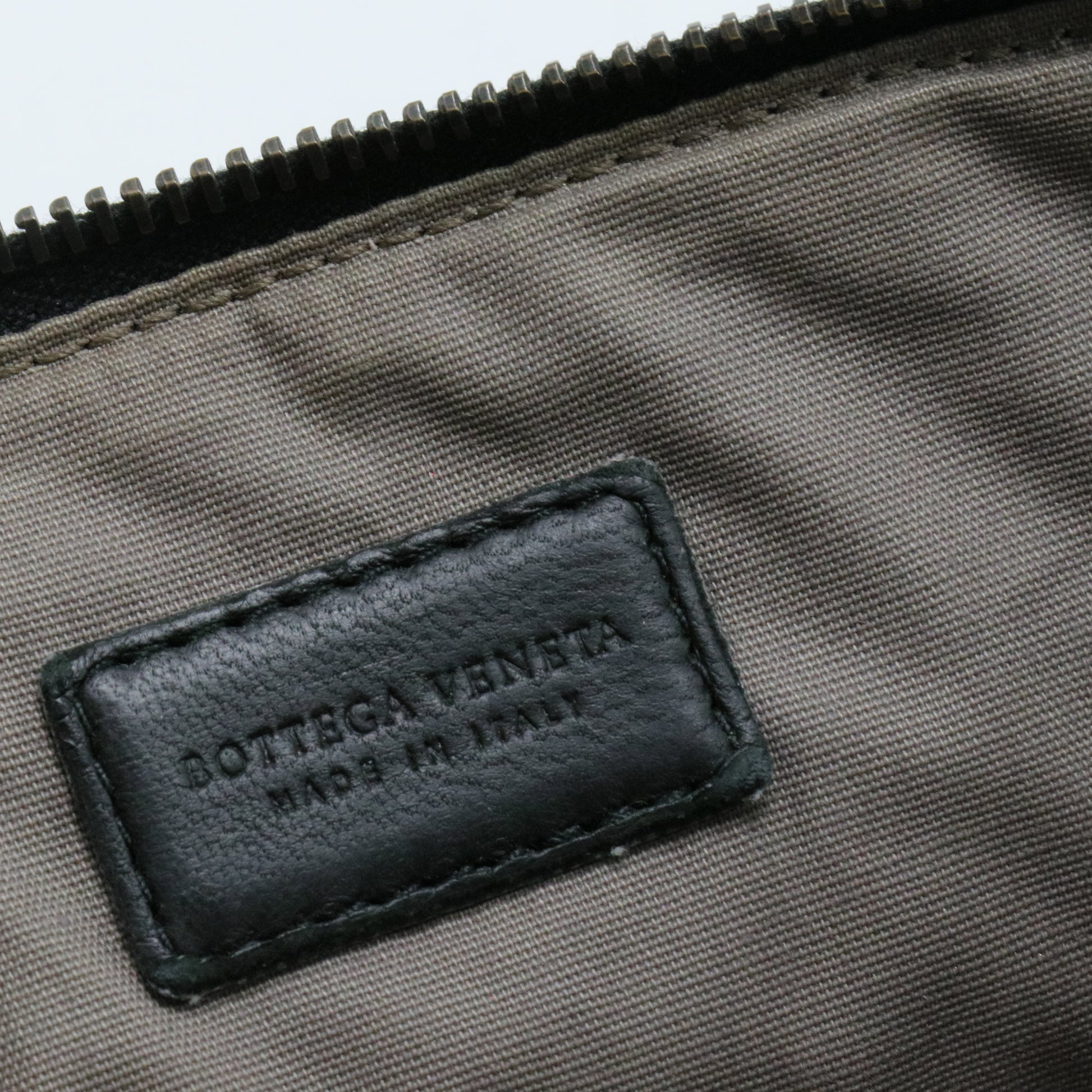 ZIPPED WEAVE WOVEN LEATHER POUCH