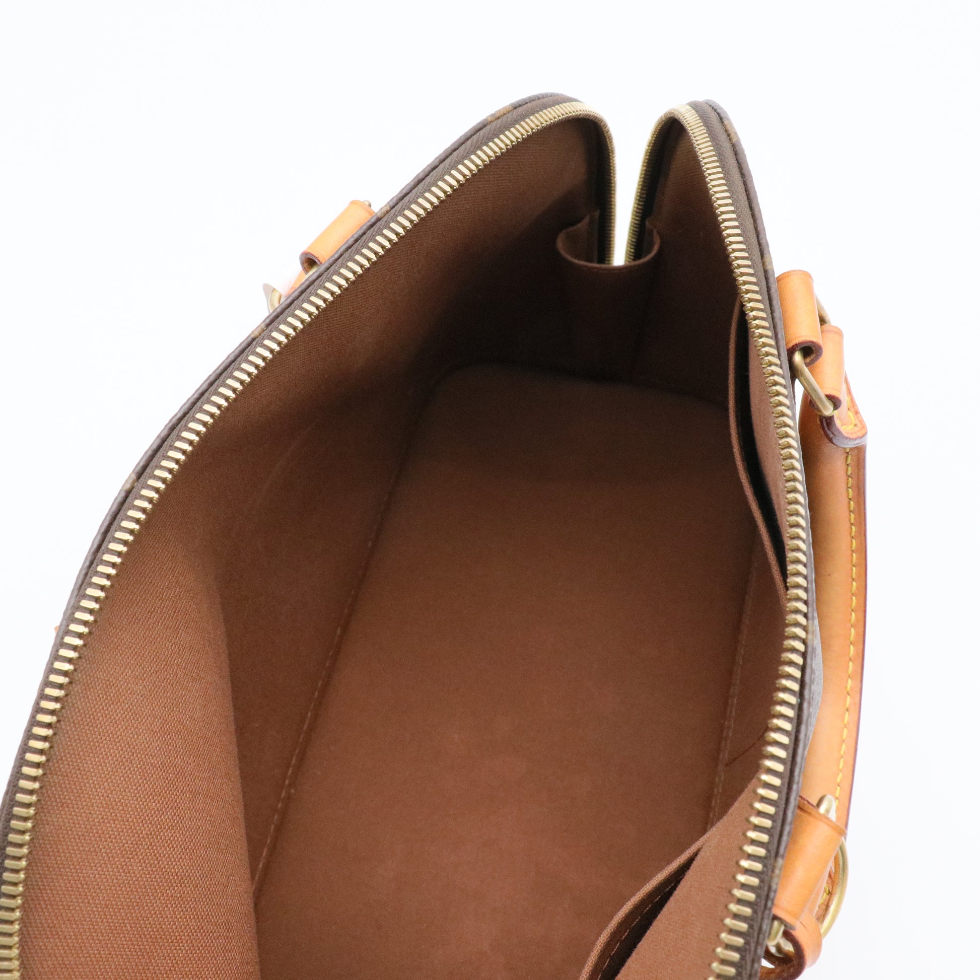 Alma Handbag Monogram Canvas PM