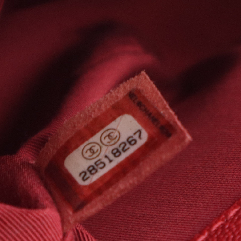 Caviar Quilted Medium Boy Flap Red B12424