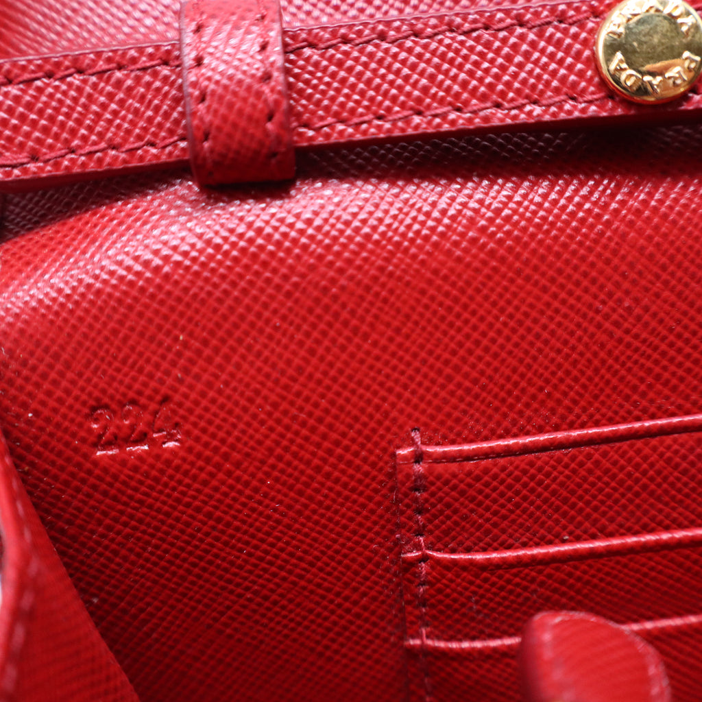 Prada Saffiano Metal Flap Wallet With Strap Fuoco B21427
