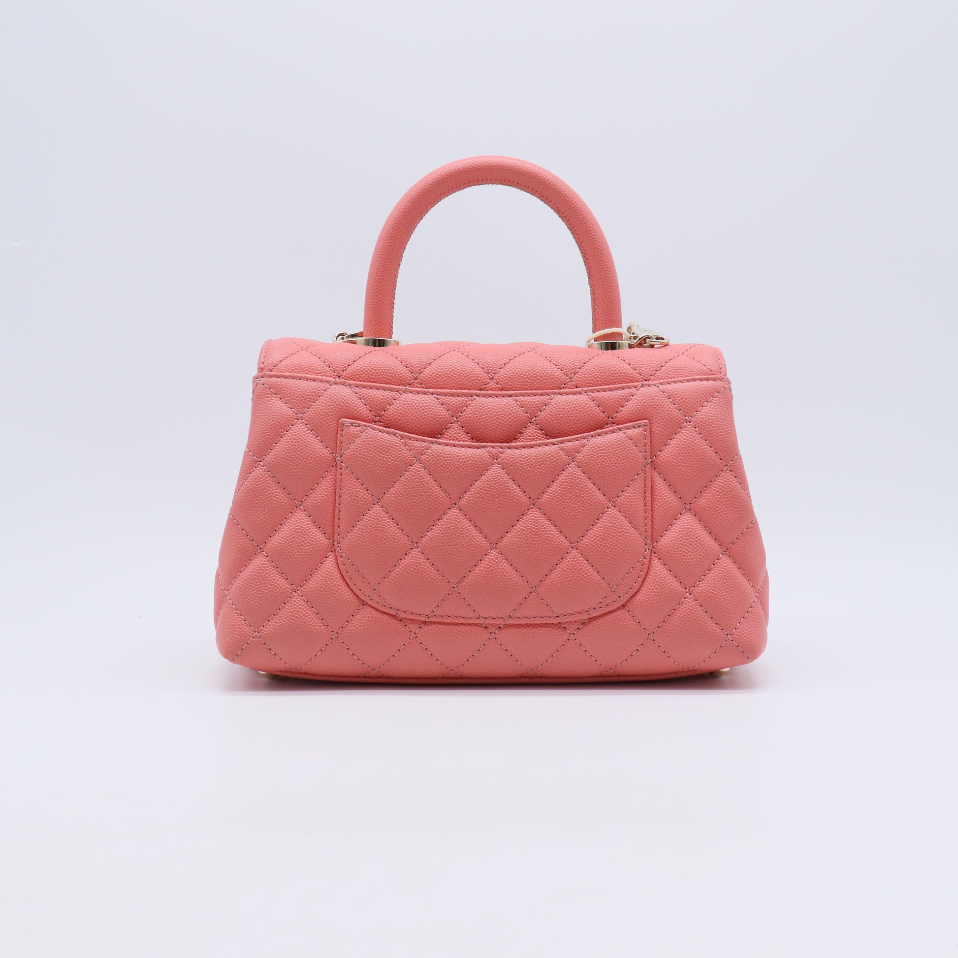 Caviar Quilted Mini Coco Handle Flap Pink B21856