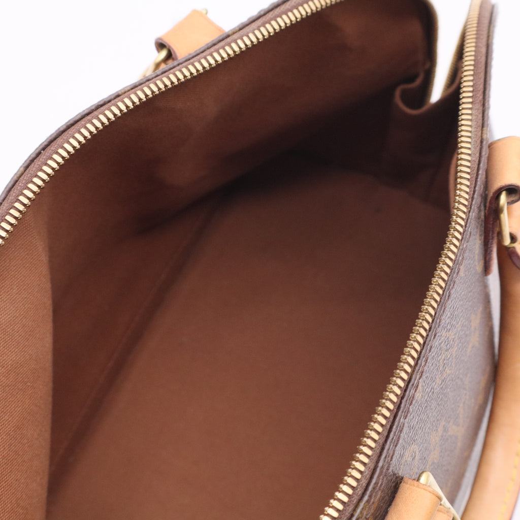 Alma Handbag Monogram Canvas PM