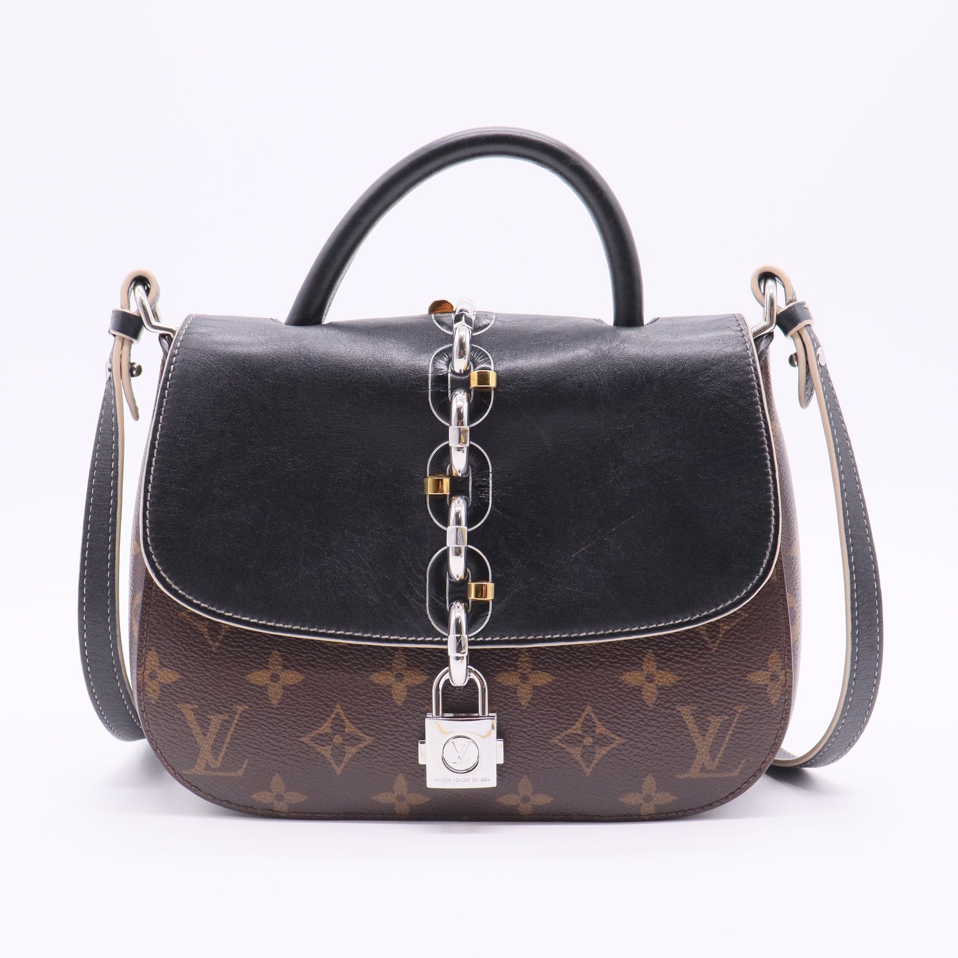Chain It Handbag Monogram Canvas with Leather PM