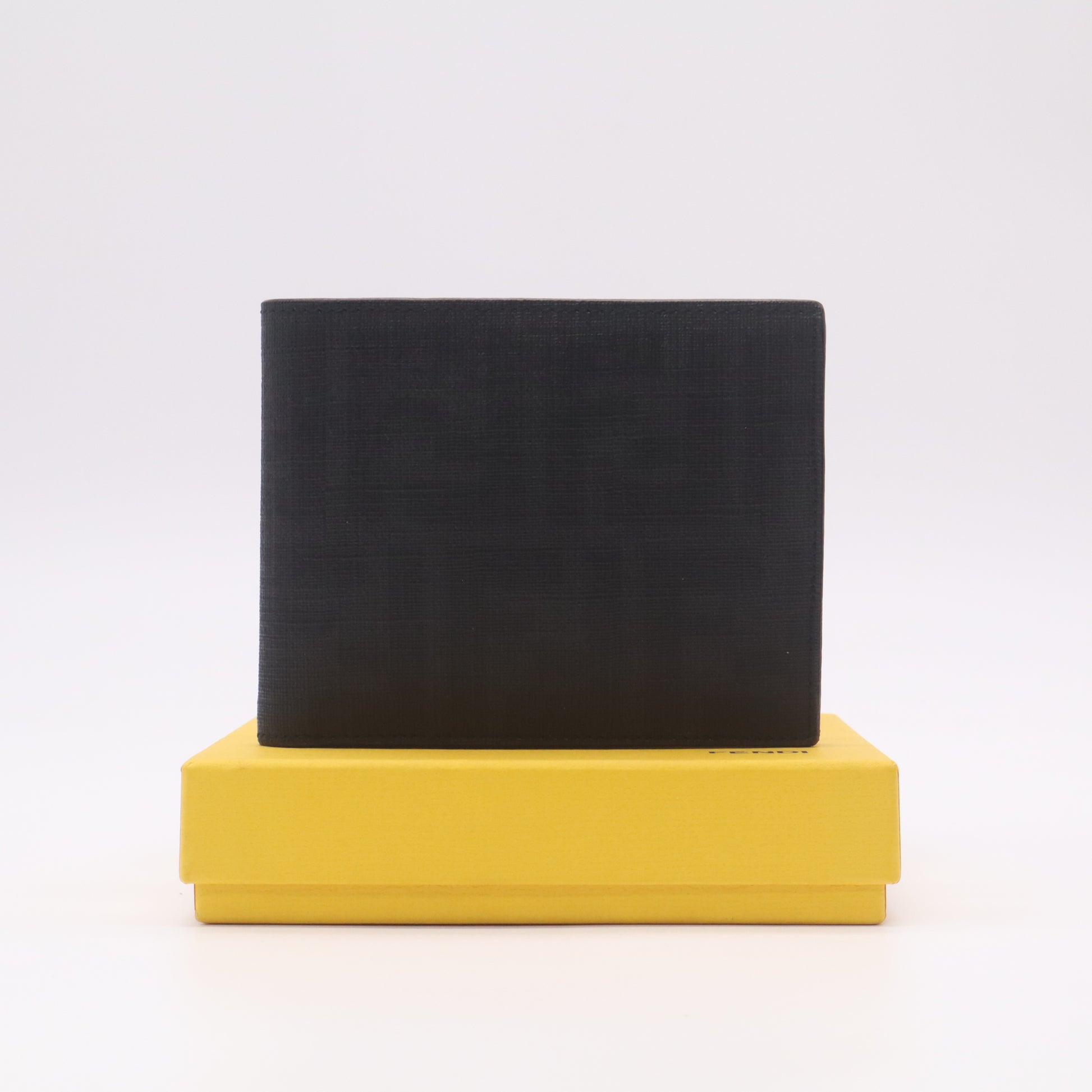Fendi FF Motif Embossed Leather Bi-Fold Wallet W22317