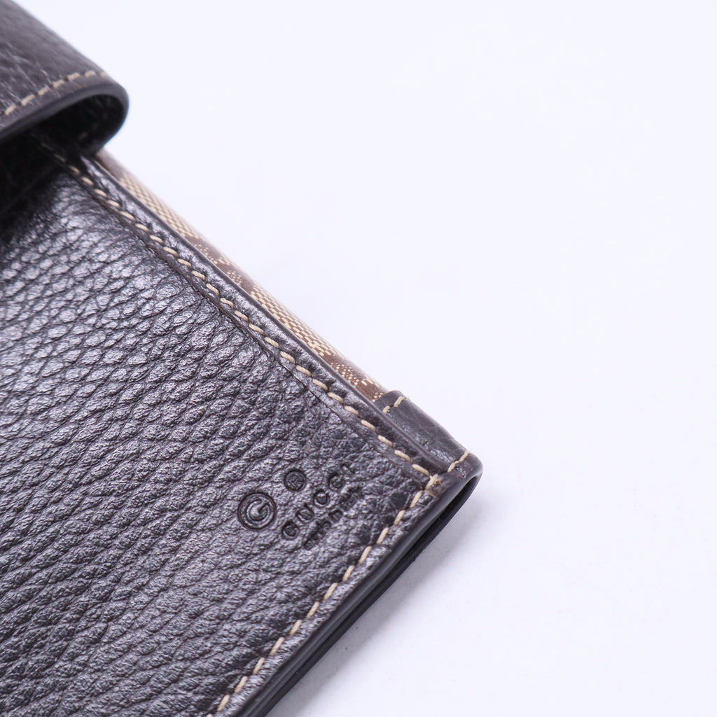 Brown and Tan Continental Wallet with Iconic GG Pattern
