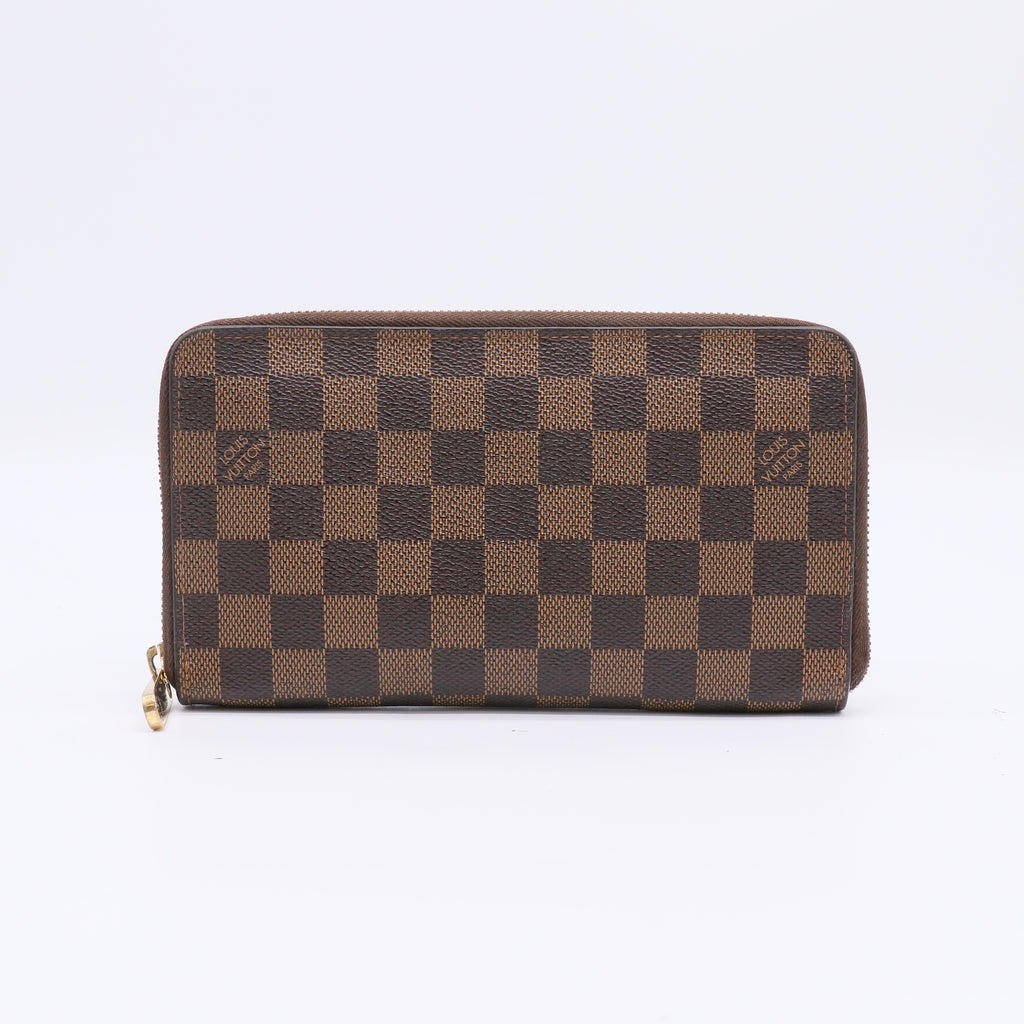 Louis Vuitton Zippy Wallet in Damier Ebene canvas W22387