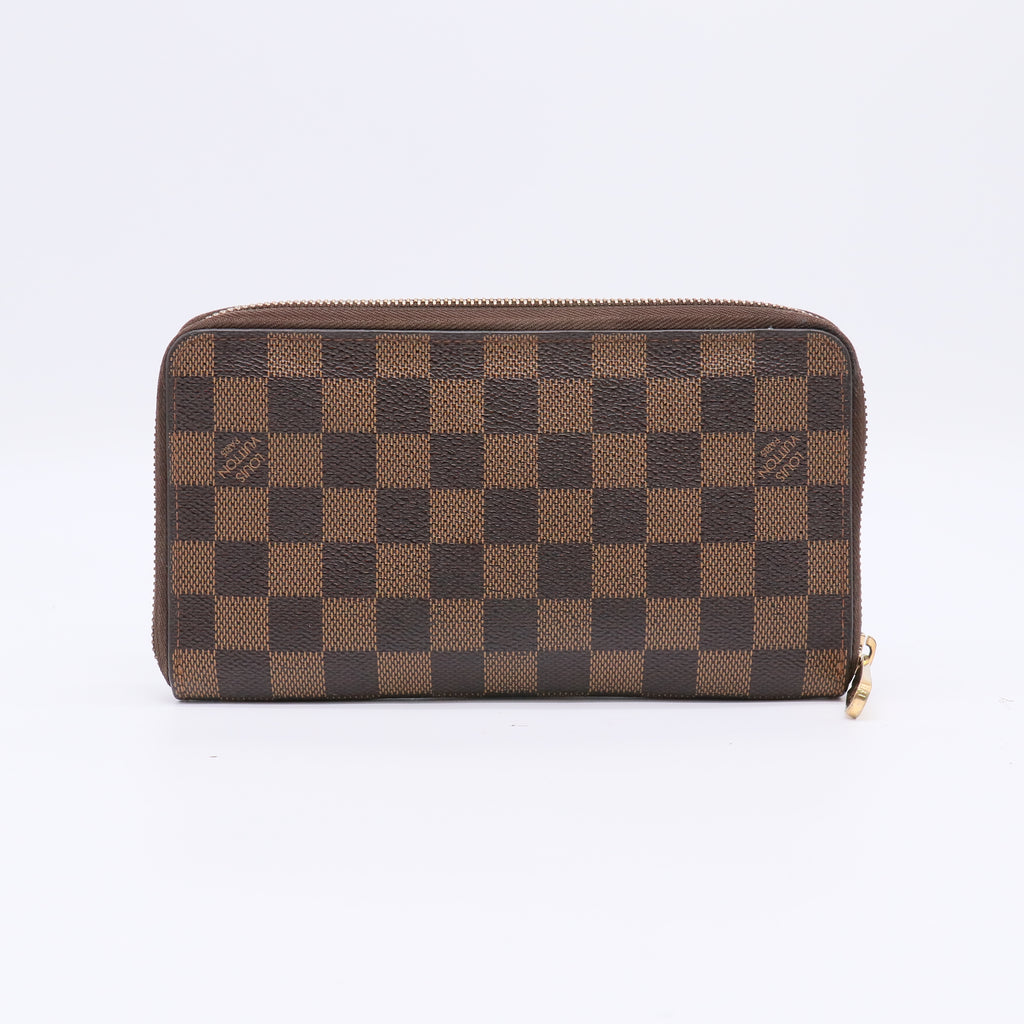 Louis Vuitton Zippy Wallet in Damier Ebene canvas W22387