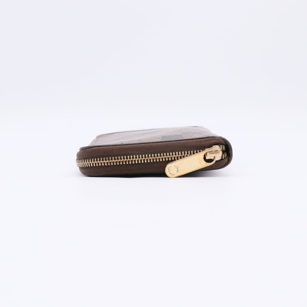 Louis Vuitton Zippy Wallet in Damier Ebene canvas W22387