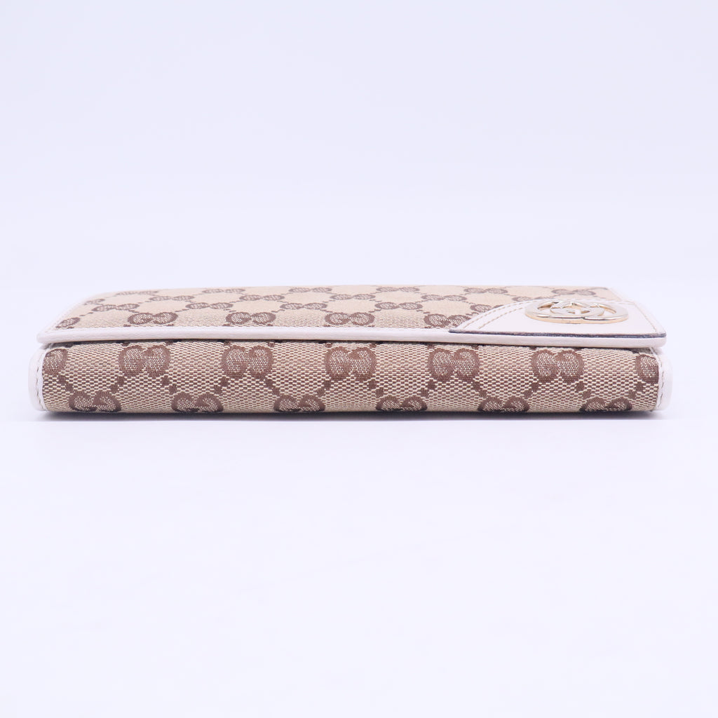 Monogram New Britt Continental Wallet Off White W20540