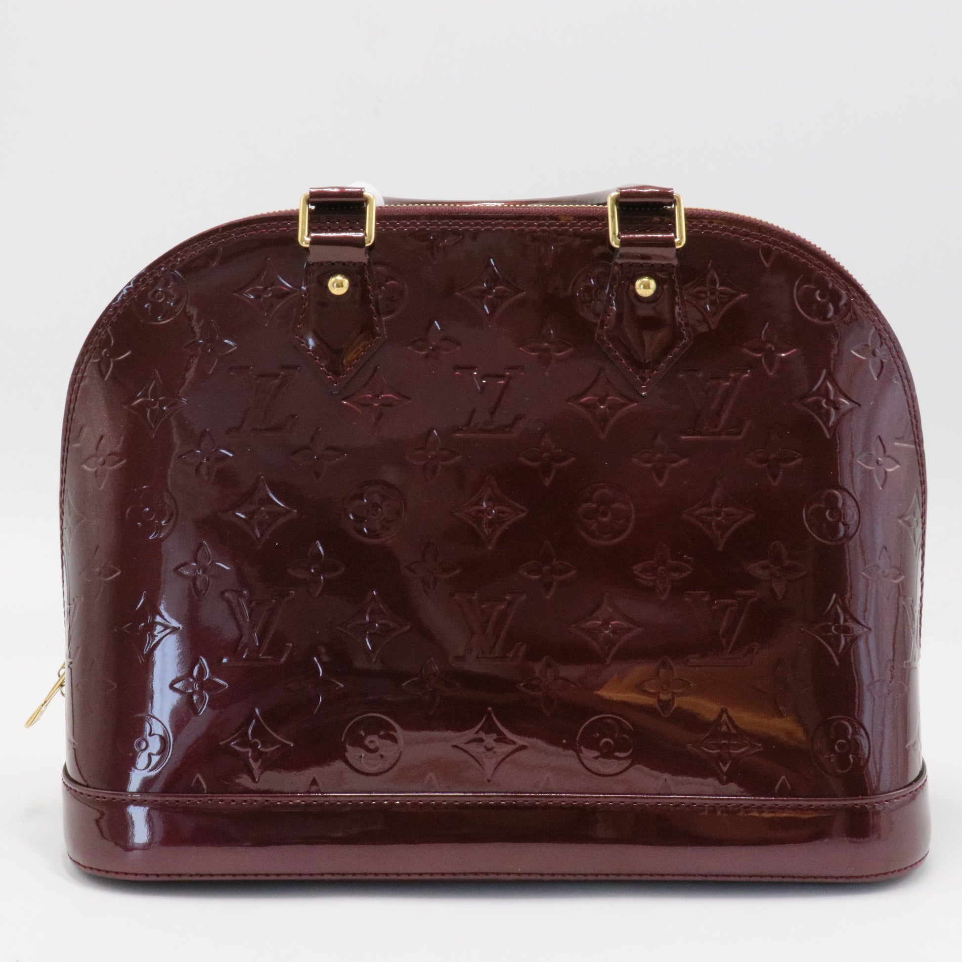 Alma Handbag Monogram Vernis PM