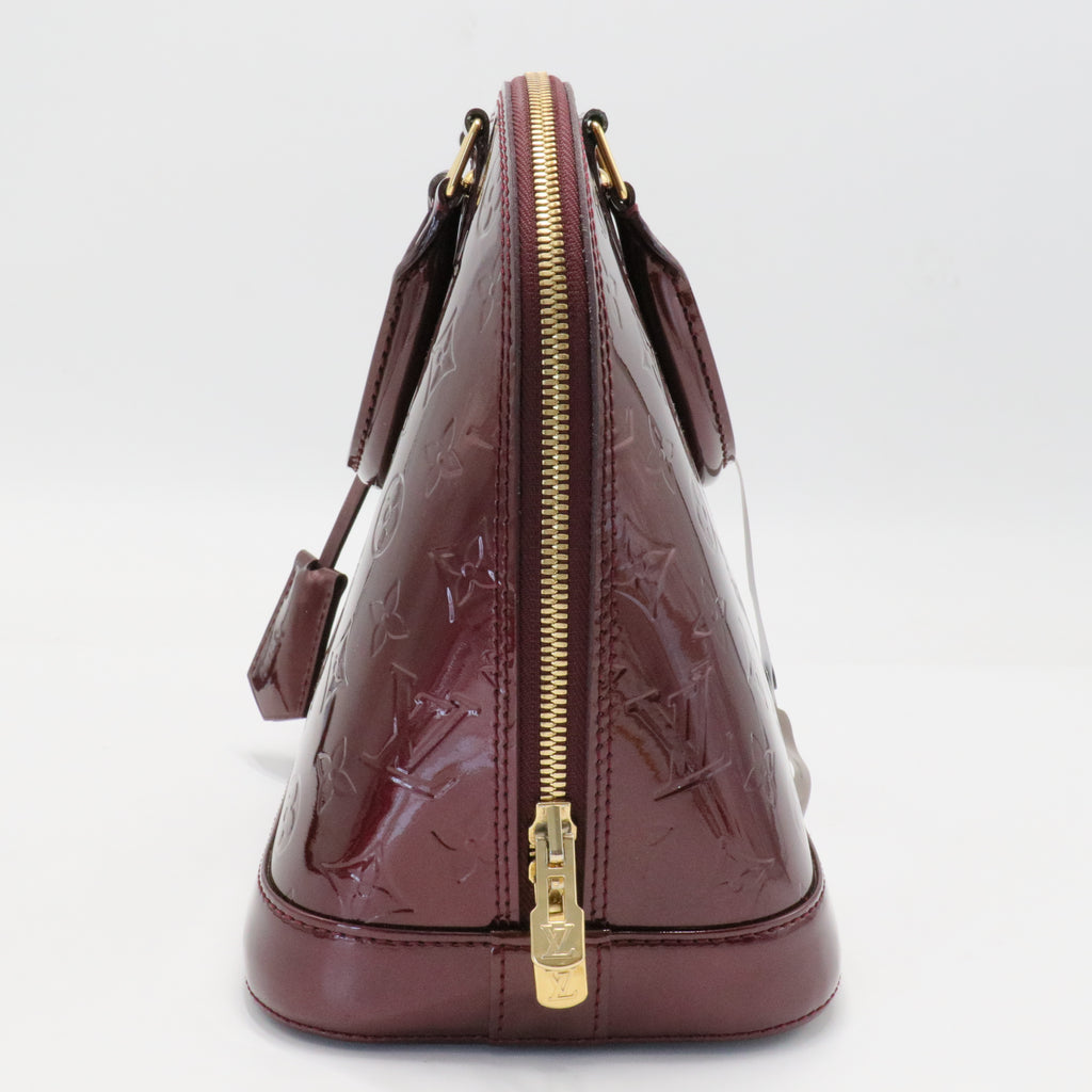 Alma Handbag Monogram Vernis PM