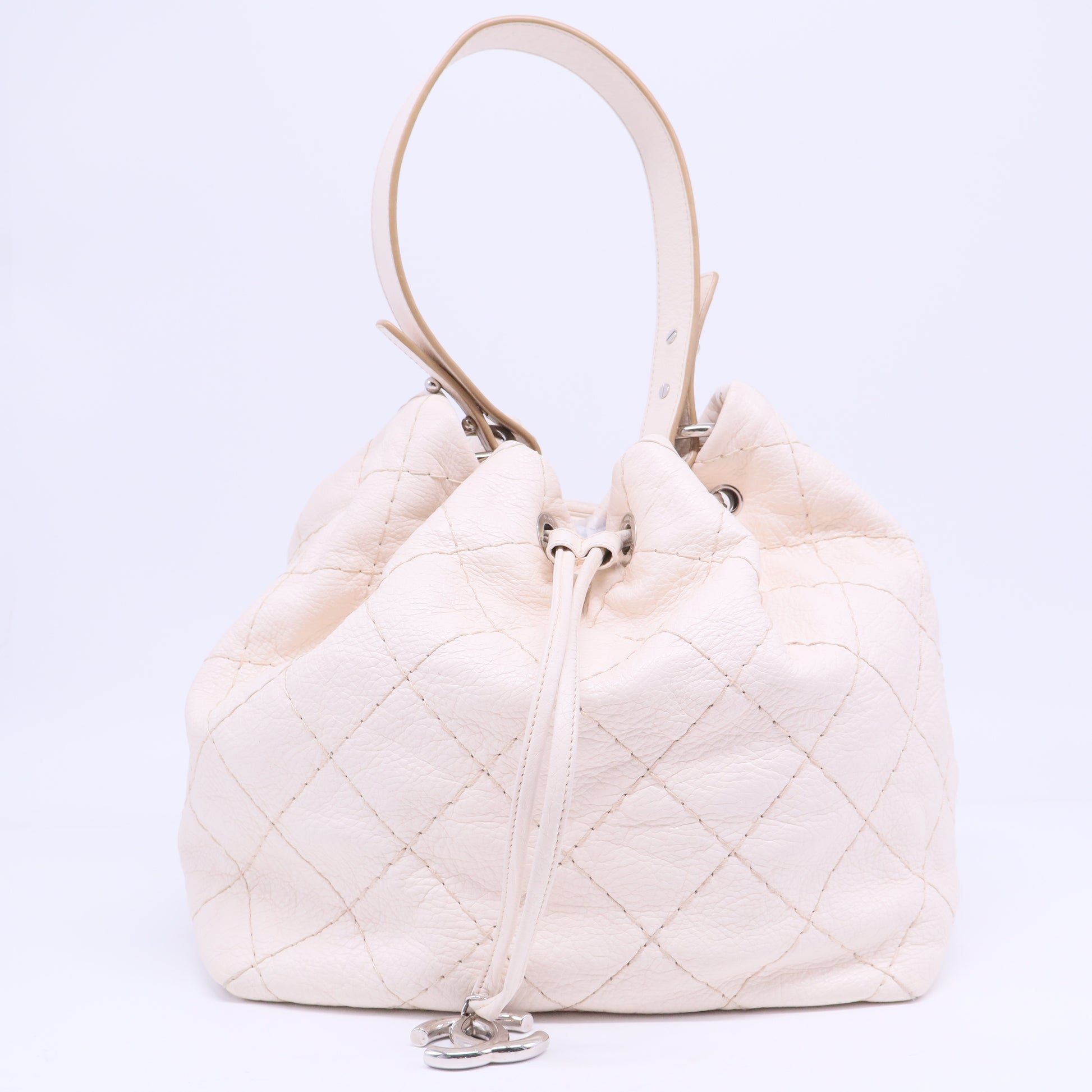 On the Road Drawstring Bucket Bag Quilted Glazed Leather B20596