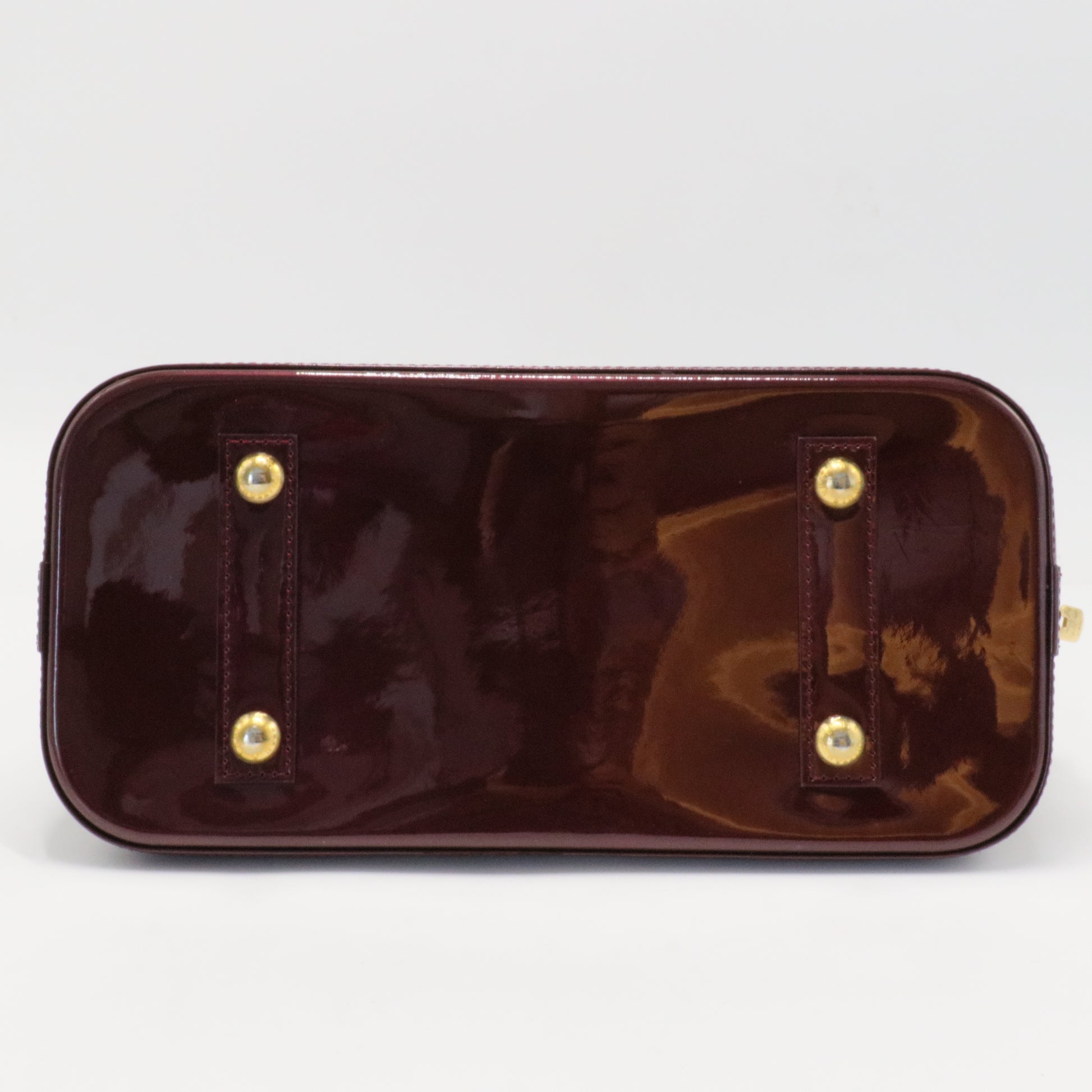 Alma Handbag Monogram Vernis PM
