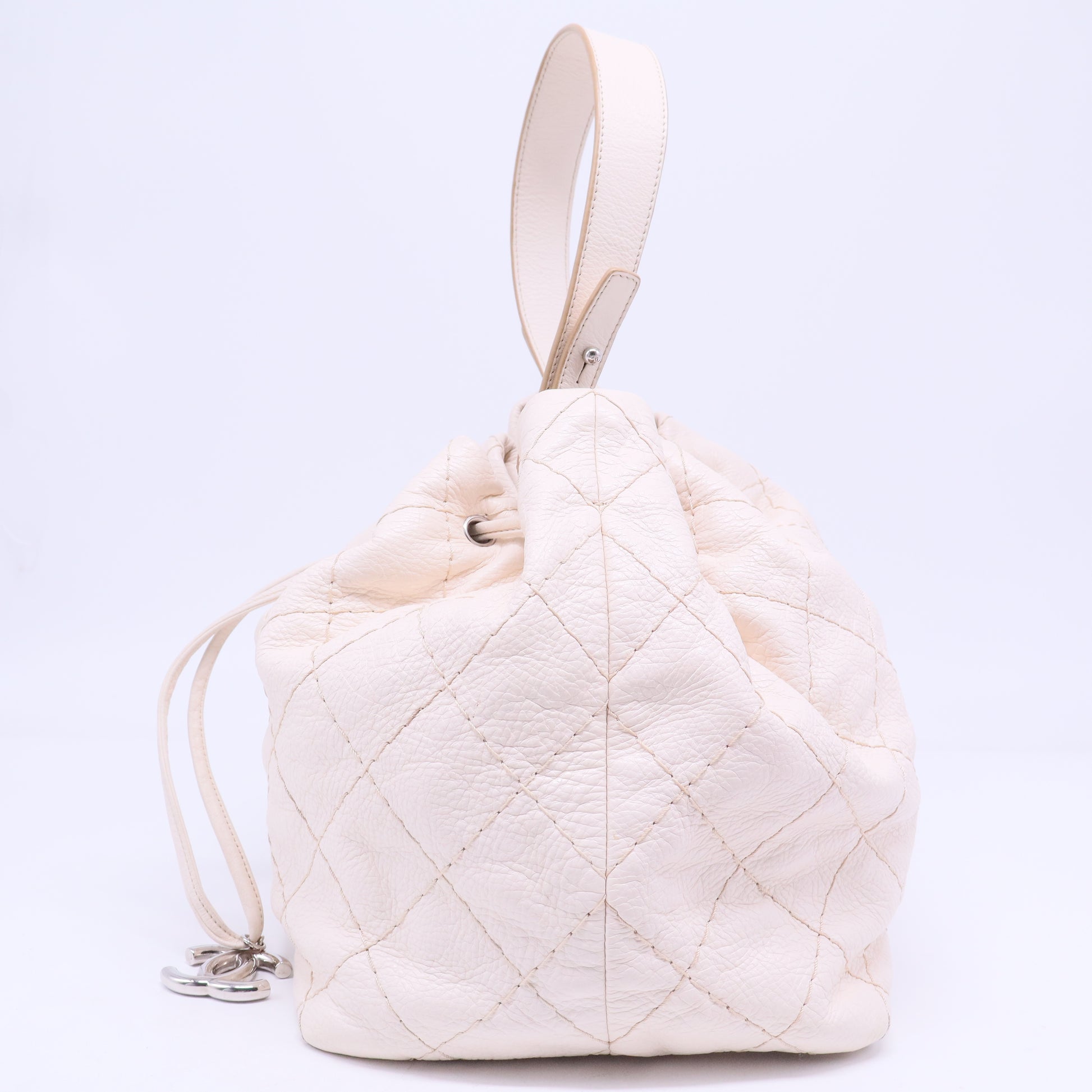 On the Road Drawstring Bucket Bag Quilted Glazed Leather B20596