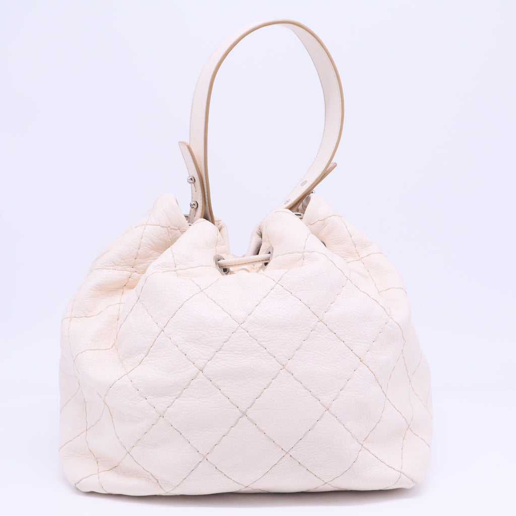On the Road Drawstring Bucket Bag Quilted Glazed Leather B20596