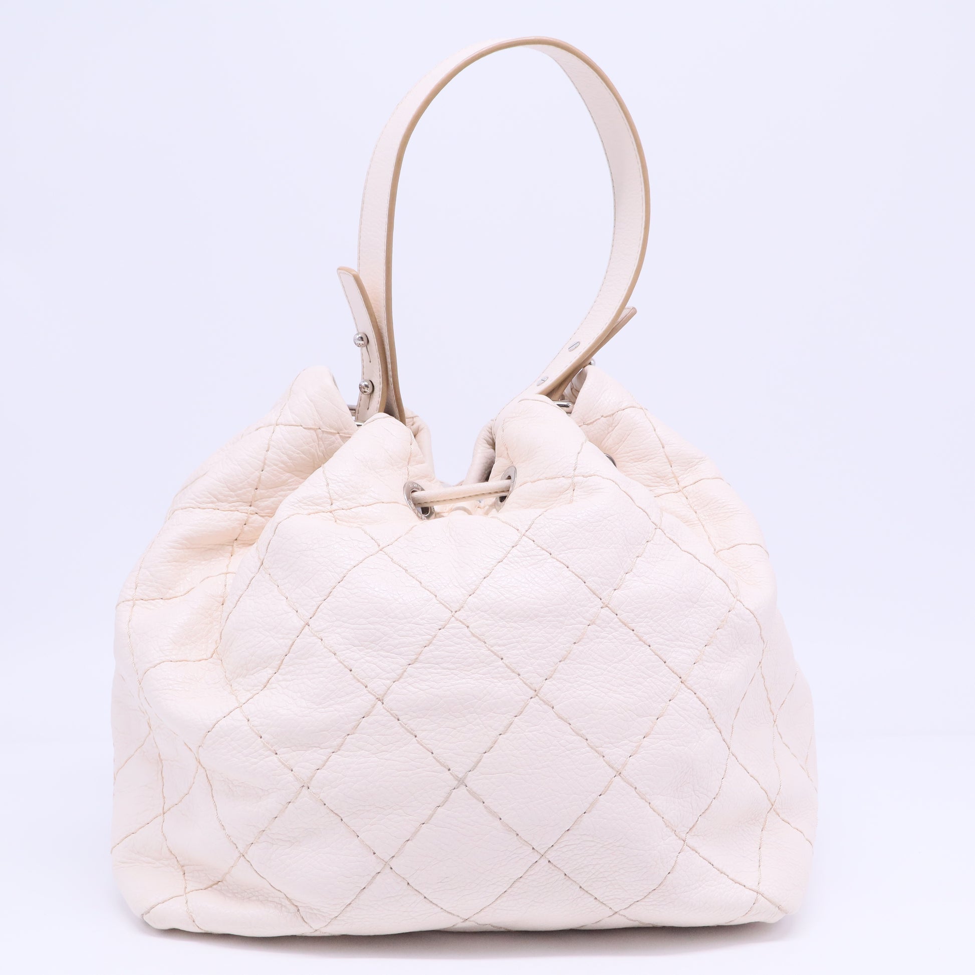 On the Road Drawstring Bucket Bag Quilted Glazed Leather B20596