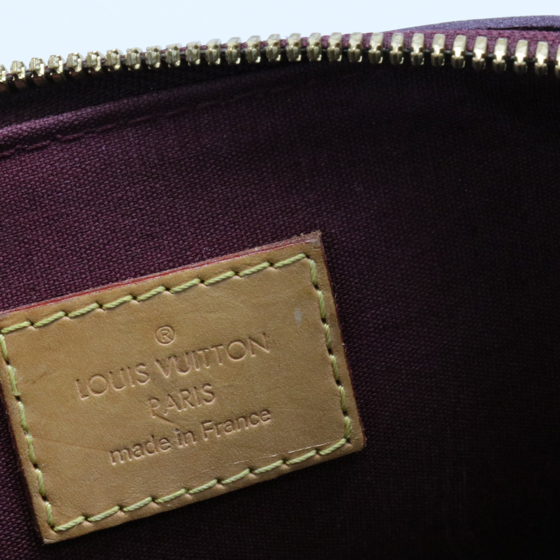 Alma Handbag Monogram Vernis PM