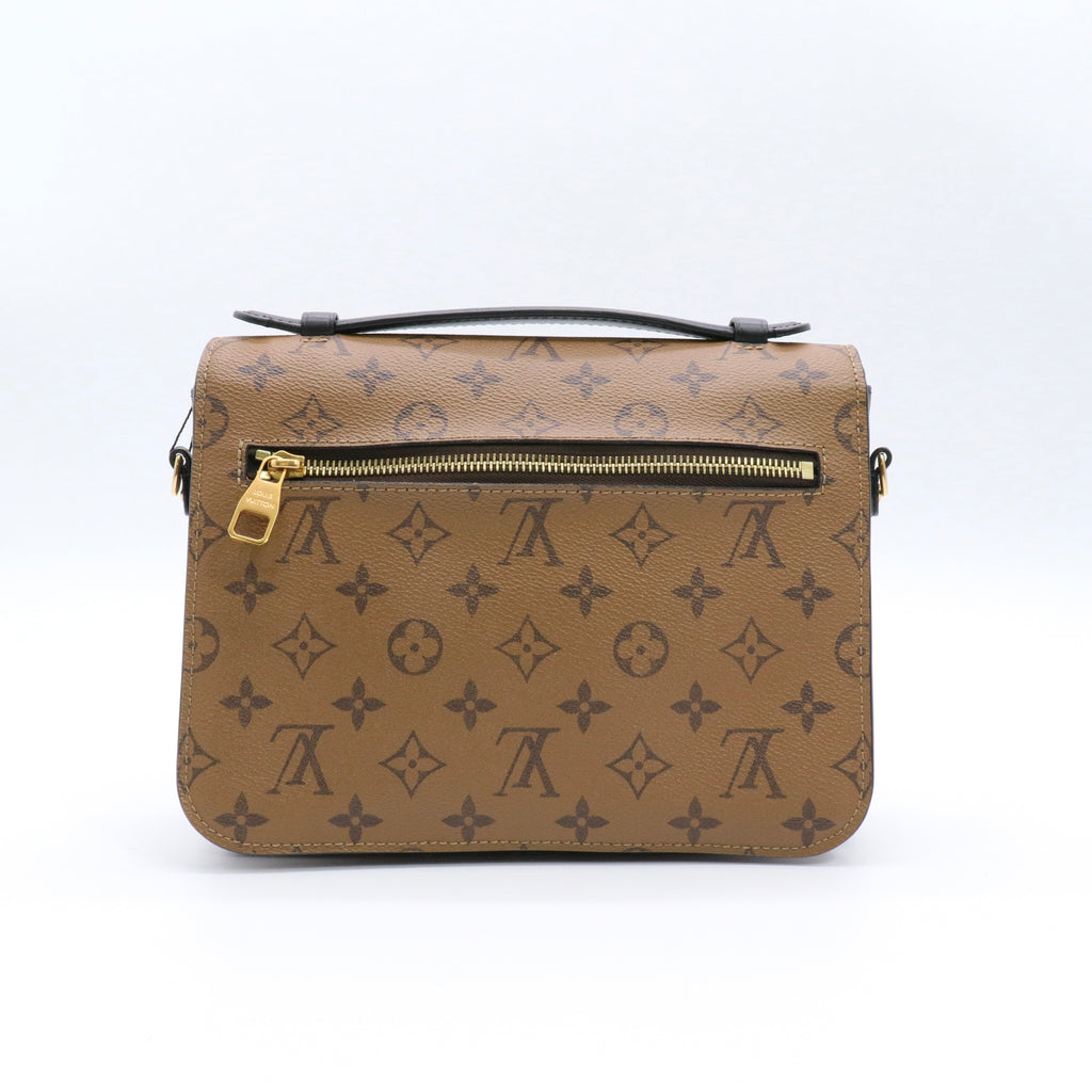 Reverse Monogram Pochette Metis twins