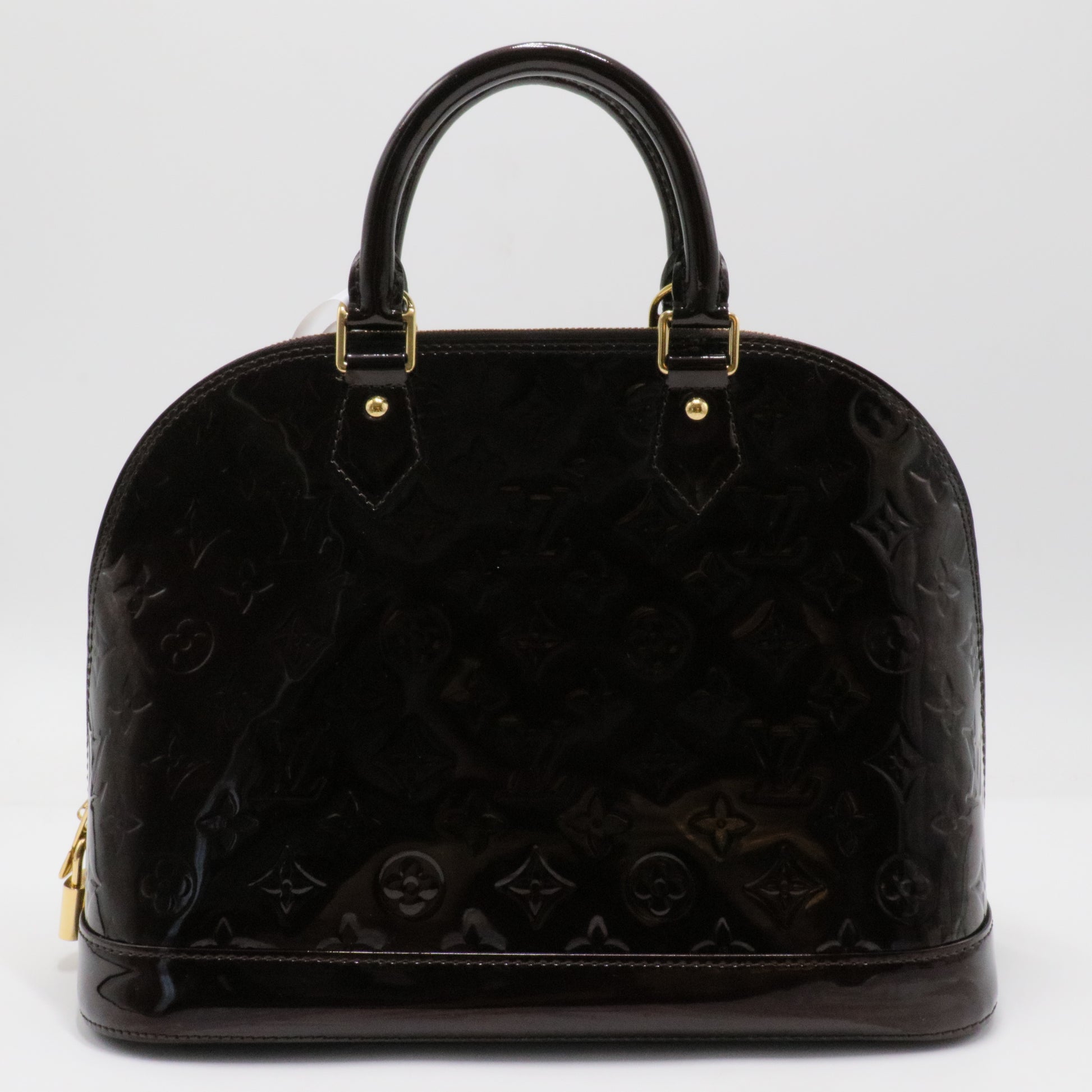 Alma Handbag Monogram Vernis PM