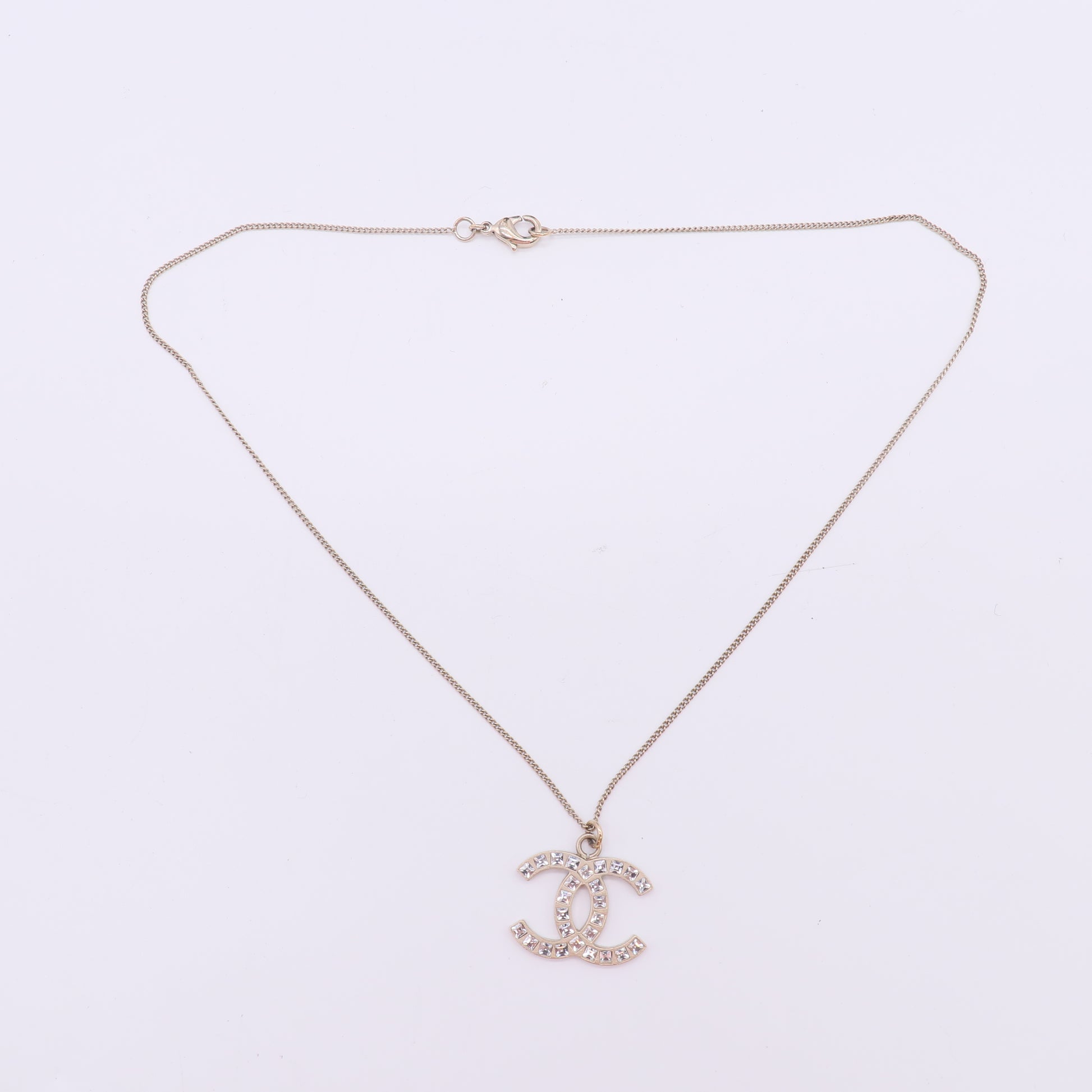 Chanel Gold Tone Baguette CC Pendant Necklace W22889