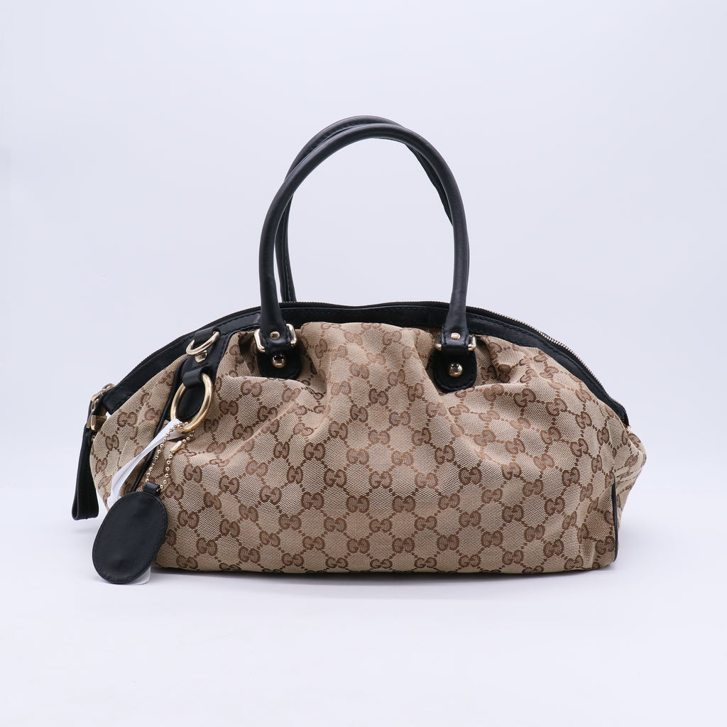Monogram Medium Sukey Boston Bag Dark Brown B21312
