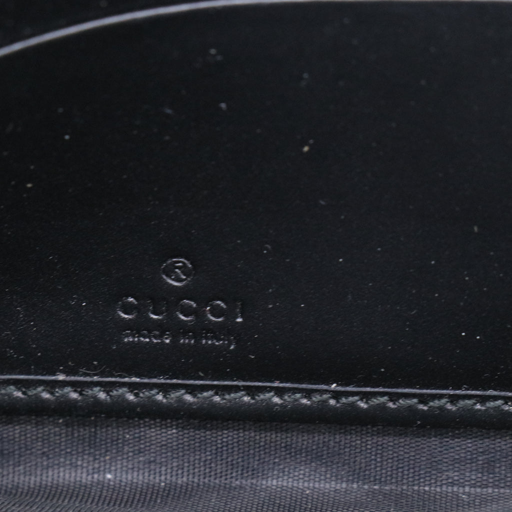 Gucci Signature Leather Zip Around Wallet W21220