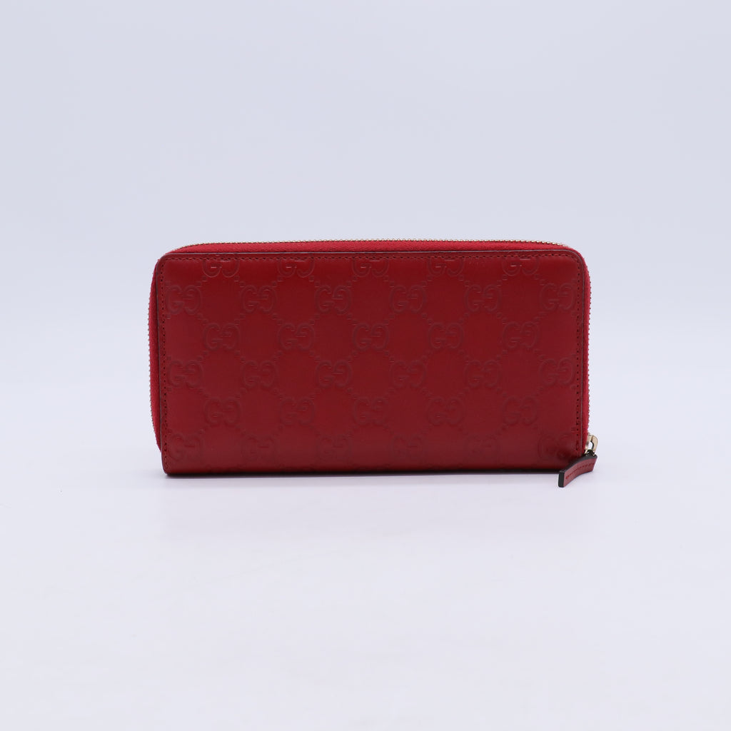 Gucci Guccissima Bow Zip Around Wallet W21231