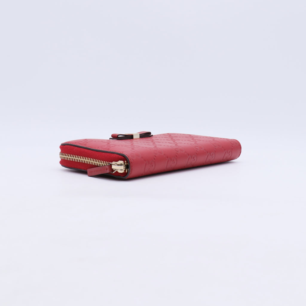 Gucci Guccissima Bow Zip Around Wallet W21231